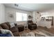 Comfortable living room with wood-style floors, perfect for relaxing and entertaining guests at 12348 Golden Wreath Rd # 1, Las Vegas, NV 89183