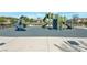 Community playground featuring slides, climbing structures, and a shaded picnic area at 12348 Golden Wreath Rd # 1, Las Vegas, NV 89183