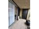 Balcony area with sliding door, tiled floor, and door at 1405 Vegas Valley Dr # 378, Las Vegas, NV 89169