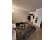 Bedroom featuring a bed with tiled floors and closet space at 1405 Vegas Valley Dr # 378, Las Vegas, NV 89169