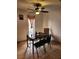 Cozy dining area features a ceiling fan, tile floors, and a window with a view at 1405 Vegas Valley Dr # 378, Las Vegas, NV 89169
