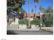 Well-maintained apartment building with a clean facade, mature trees, and tidy landscaping at 1405 Vegas Valley Dr # 378, Las Vegas, NV 89169