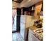 Functional kitchen with white appliances and granite countertops providing ample counter space at 1405 Vegas Valley Dr # 378, Las Vegas, NV 89169