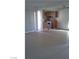 Open living space with tile flooring and a view into the kitchen, providing a spacious feel at 1405 Vegas Valley Dr # 378, Las Vegas, NV 89169