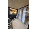 Covered patio with sliding glass doors, showcasing the indoor-outdoor living space at 1405 Vegas Valley Dr # 378, Las Vegas, NV 89169