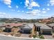Expansive aerial view highlights the community's layout, architecture, and desirable location at 171 Palm Fox Ct, Henderson, NV 89011