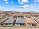 Aerial view of the backyard with covered patio and low-maintenance landscape at 171 Palm Fox Ct, Henderson, NV 89011