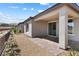 Backyard patio with desert landscaping, and stucco wall at 171 Palm Fox Ct, Henderson, NV 89011