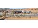 Enjoy views from the low-maintenance backyard, enclosed with a black metal fence at 171 Palm Fox Ct, Henderson, NV 89011
