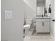 Half-bathroom with granite countertop and sink at 171 Palm Fox Ct, Henderson, NV 89011