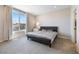 Comfortable bedroom with a large window offering scenic mountain views and neutral decor at 171 Palm Fox Ct, Henderson, NV 89011