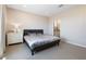 Cozy bedroom featuring a comfortable bed, dresser, and ample natural light at 171 Palm Fox Ct, Henderson, NV 89011