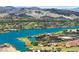 Scenic aerial view of a lakefront community with golf courses and resort at 171 Palm Fox Ct, Henderson, NV 89011