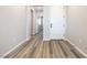 Clean, modern entryway with wood floors and a view into the home at 171 Palm Fox Ct, Henderson, NV 89011