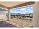 Covered patio with brick flooring and views of the desert community at 171 Palm Fox Ct, Henderson, NV 89011