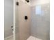 Modern walk-in shower with sleek hardware and neutral tile at 171 Palm Fox Ct, Henderson, NV 89011