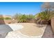 Backyard with desert landscaping and a patio area at 180 Duck Hollow Ave, Las Vegas, NV 89148