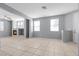 Spacious open floor plan featuring tile floors, neutral paint, and lots of natural light at 180 Duck Hollow Ave, Las Vegas, NV 89148