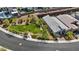 Beautiful aerial view of a home, showcasing a large lawn and well-manicured landscaping, creating a serene outdoor space at 1957 Regal Bluff Dr, Henderson, NV 89052