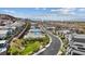 Aerial view of a neighborhood nestled near the mountains, offering convenient access to the city and airport at 1957 Regal Bluff Dr, Henderson, NV 89052