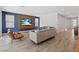 Cozy living room highlighting a modern TV, comfortable seating, and stylish decor at 1957 Regal Bluff Dr, Henderson, NV 89052