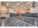 Spacious indoor basketball court with hoop, equipment, and recessed lighting at 2086 Troon Dr, Henderson, NV 89074