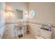 Bathroom featuring a unique vanity and decorative wall tiles at 2086 Troon Dr, Henderson, NV 89074