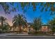 Beautiful single-Gathering home with manicured lawn, mature trees, and private driveway at 2086 Troon Dr, Henderson, NV 89074