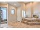 Lavish main bathroom with soaking tub, walk-in shower, and elegant finishes for a spa-like experience at 2086 Troon Dr, Henderson, NV 89074