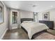 Bedroom features a large picture window and modern furnishings and decor at 2104 Plaza De La Candela, Las Vegas, NV 89102
