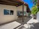 Spacious patio area features a tile roof providing shade and a comfortable outdoor living space at 2104 Plaza De La Candela, Las Vegas, NV 89102