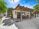 Wonderful covered patio with dining area and seating, ideal for entertaining guests or enjoying outdoor meals at 2104 Plaza De La Candela, Las Vegas, NV 89102