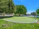 Putting green alongside tennis court at 2104 Plaza De La Candela, Las Vegas, NV 89102