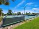 Outdoor community tennis courts, surrounded by trees and landscaping, offers multiple lighted courts for play at 2104 Plaza De La Candela, Las Vegas, NV 89102