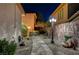 Landscaped backyard with a firepit at 2124 Pont National Dr, Henderson, NV 89044