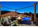 Charming balcony with a comfortable seating area and firepit at 2124 Pont National Dr, Henderson, NV 89044