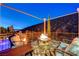 Stunning view from balcony seating surrounding built-in firepit at 2124 Pont National Dr, Henderson, NV 89044