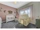 Charming bedroom features plush carpeting, a crib, a daybed and play tent at 2124 Pont National Dr, Henderson, NV 89044