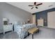 Comfortable bedroom with carpet, ceiling fan, and side tables, perfect for relaxation at 2124 Pont National Dr, Henderson, NV 89044