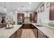 Modern kitchen with stainless steel appliances, granite countertops, and ample storage space at 219 Windsong Dr, Henderson, NV 89074