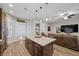 View of kitchen island open to the living room at 219 Windsong Dr, Henderson, NV 89074