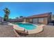 An inviting backyard pool is surrounded by mature landscaping and a spa at 2711 Briarcliff Ave, Henderson, NV 89074