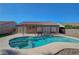This backyard features a pool, spa and covered patio perfect for relaxing at 2711 Briarcliff Ave, Henderson, NV 89074