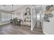 Open dining room features hardwood floors, modern decor, and plenty of natural light at 2711 Briarcliff Ave, Henderson, NV 89074