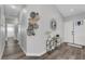 Bright entryway with hardwood floors, stylish decor, and easy access to the main living areas at 2711 Briarcliff Ave, Henderson, NV 89074