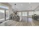 Bright, open kitchen features modern appliances, a center island with bar seating, and hardwood floors at 2711 Briarcliff Ave, Henderson, NV 89074