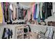 Walk-in closet featuring wire shelving and rods for maximum storage at 2711 Briarcliff Ave, Henderson, NV 89074