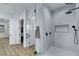 Sleek bathroom with a frameless glass shower enclosure and matte black fixtures at 2873 Knoxville Ct, Henderson, NV 89052