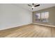 Spacious bedroom with modern fan, neutral color walls, and wood floors at 2873 Knoxville Ct, Henderson, NV 89052