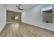Large bedroom with neutral walls and light-colored wood floors at 2873 Knoxville Ct, Henderson, NV 89052